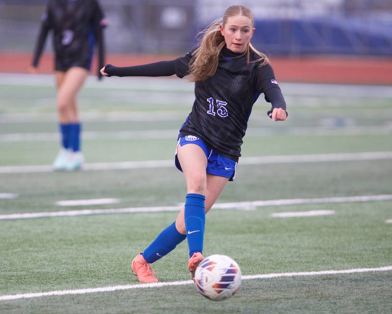 St. Charles North's Keira Connolly kicks the ball down field against Wheaton North on Thursday, April 10,2025 in St. Charles.