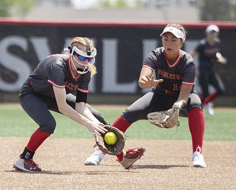 Charleston’s Avery Beals plays plays the ball in front of teammate Blair Ritche against Antioch Friday, June 9, 2023 in the class 3A state softball semifinal.