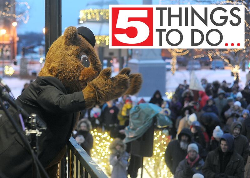 The Woodstock Willie mascot greets the crowd the 2022 Groundhog Day Prognostication on the Woodstock Square.