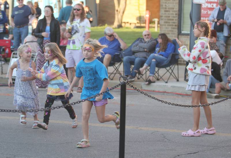 Kids run around at the  Down on Main Street Summer Concert on Friday, Aug. 9, 2024 in Princeton.