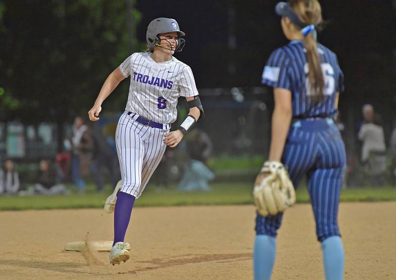 Downers Grove North’s Jenna Gordon rounds second base after hitting a walk off home run ending a game against Downers Grove South on May 14, 2026 at McCollum Park in Downers Grove.