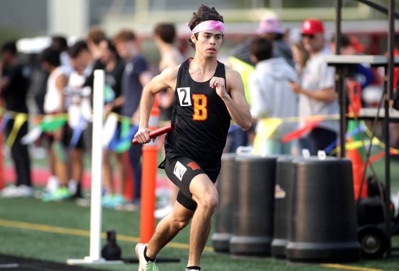 Batavia’s Felipe Wickler takes off in the anchor leg of the 4x800-meter relay during the Class 3A Batavia track and field sectional on Thursday, May 18, 2023.