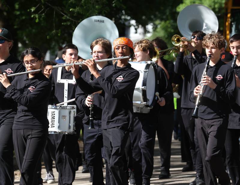 Members of the Huntley and Clinton Rosette J-Barbs Marching Band play Monday, May 26, 2025, during the Memorial Day parade in DeKalb.