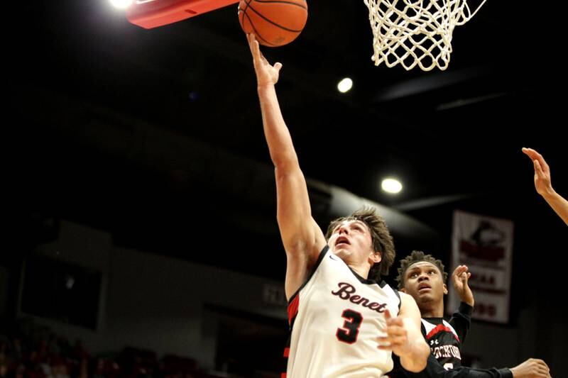 Benet’s Brady Kunka gets the ball to the basket during the Class 4A NIU Supersectional against Rockford Auburn in DeKalb on Monday, March 6, 2023.