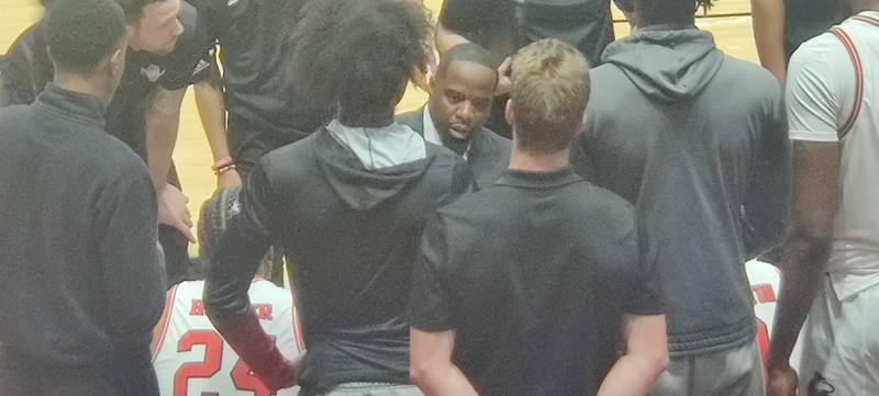 NIU coach Rashon Burno talks to his team during a timeout against Toledo on Saturday, January 14, 2023.