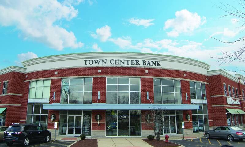 The multi-use commercial building located at 1038 W. Lincoln Hwy.  in New Lenox (southwest corner of Lincoln Highway and Schoolhouse Road), is now known as the Town Center Bank Building.