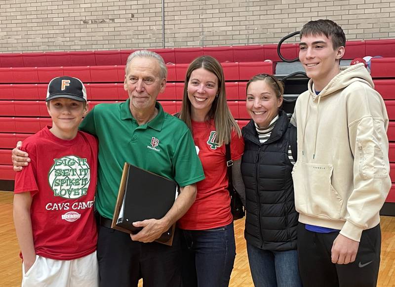 L-P head coach Mark Haberkorn poses with family members Carson Glass, Mary Jo Glass, Melinda Nett and Nicholas Glass after getting his 1000th career win against Ottawa on Tuesday, Oct. 18, 2022 at Kingman Gymnasium in Ottawa. Haberkorns family flew in this morning from Nev. and Wash. to celebrate his victory.