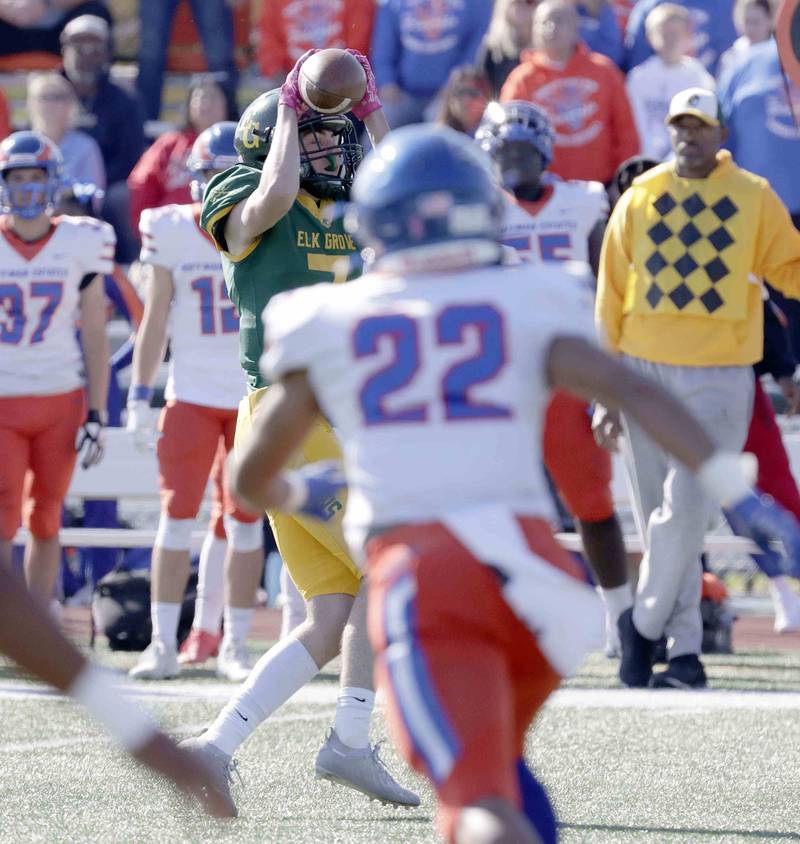 Elk Grove’s Lucas Rogers, 7, reels in a pass Saturday October 29, 2022 in Elk Grove Village.
