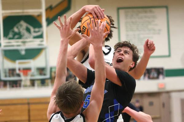 Josiah Mitchell, Marcus Johnson, smothering Sycamore defense lead to regional title over Woodstock