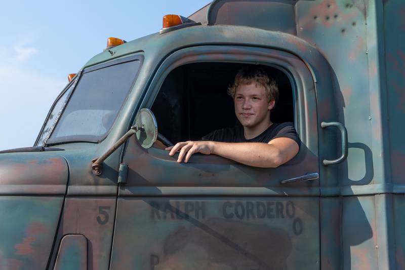 Seth Hays sits in driver seat of truck seen in movie "Jeepers Creepers" on Saturday, August 9, 2025 at the annual Wenona Days on Chestnut Street in Wenona.