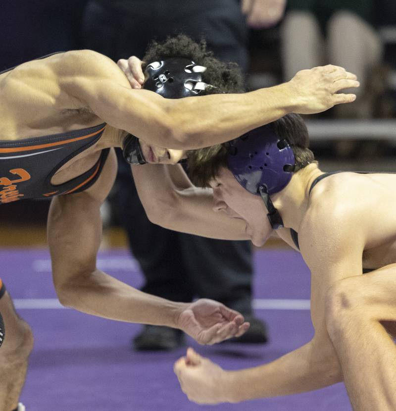 Dixon’s Doolan Long (right) faces off against Freeport’s Jaylen LowemTuesday, Jan. 13, 2025, during a triangular meet with Sterling at Dixon High School.