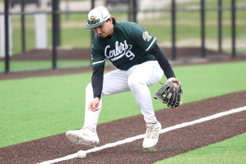 Coal City's Drake Stewart fields a bunt during a home game against Wilmington Monday, April 21, 2025.