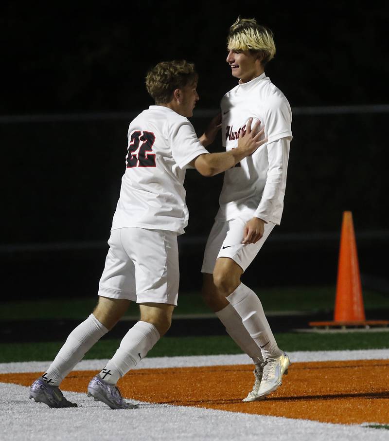 Huntley's Cody Hammer celebrates his goal against McHenry with teammate, Tyler Murray , during a Fox Valley Conference boys soccer match on Thursday, Oct. 9, 2025, at McCracken Field in McHenry.