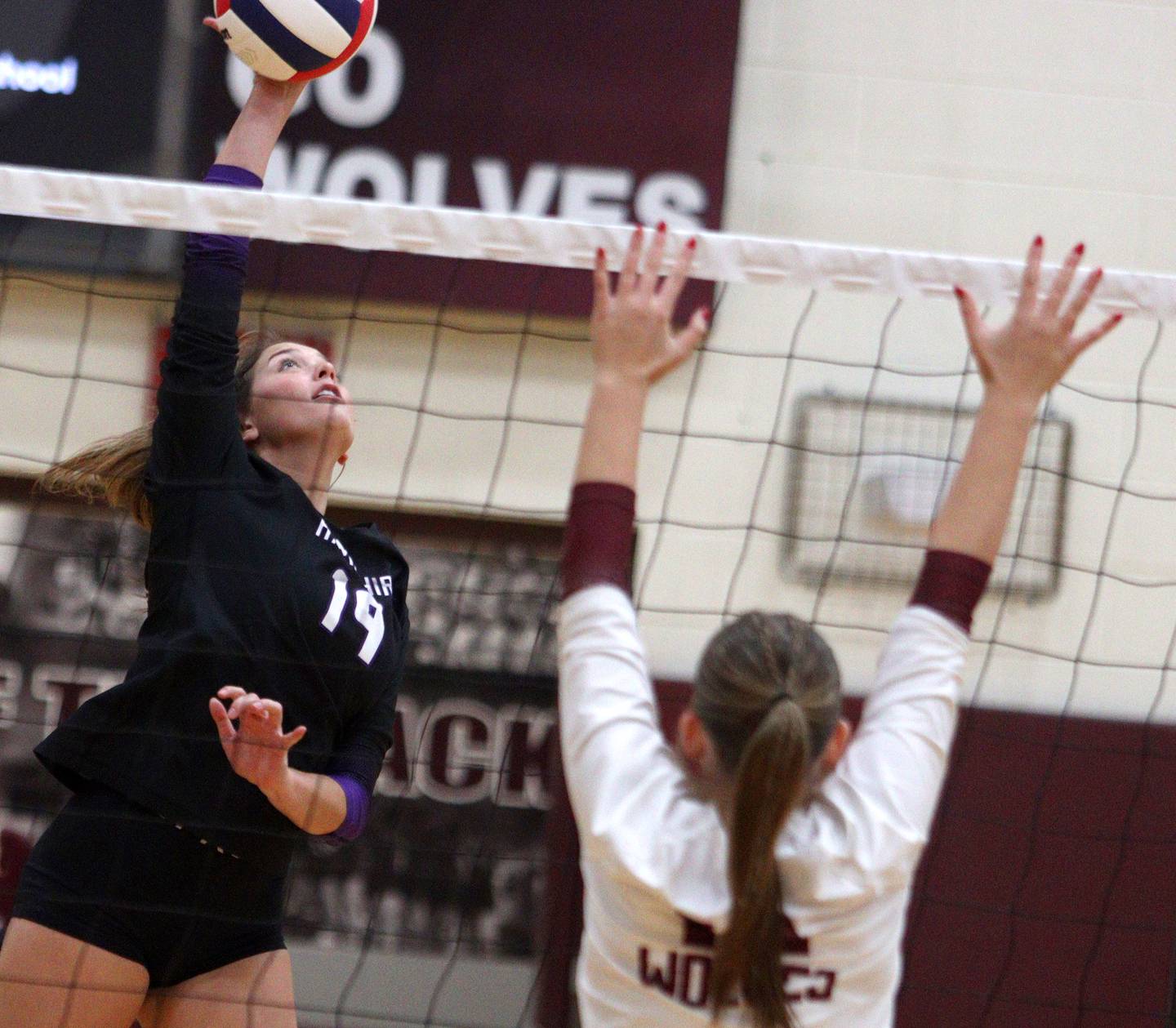 Hampshire’s Katelyn Petterson hits the ball during varsity volleyball on Thursday, Oct. 3, 2024, at Prairie Ridge High School in Crystal Lake.