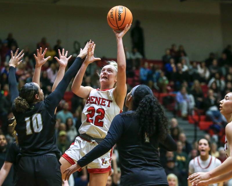 Benet's Bridget Rifenburg (22) puts up a shot during their Class 4A Bolingbrook Sectional final basketball game between Waubonsie Valley at Benet. Feb 27, 2025 in Bolingbrook.