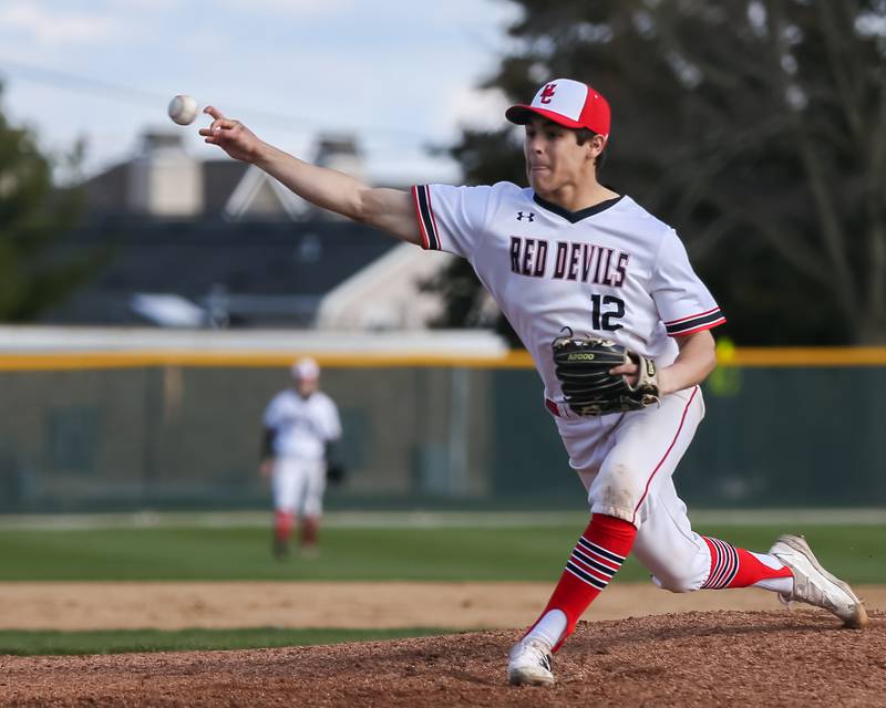 Hinsdale Central's Lucas Montesantos (12) delivers a pitch during baseball game between Lyons at Hinsdale Central. April 19, 2022.