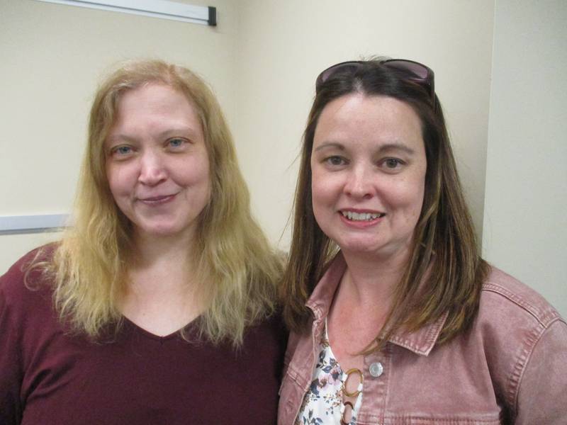 Amy Hunte of Yorkville, right, was attacked by a dog earlier this year and neighbor Amanda Buchanan, left, came to her aid. They are seen here after the June 27, 2023 Kendall County Board meeting.