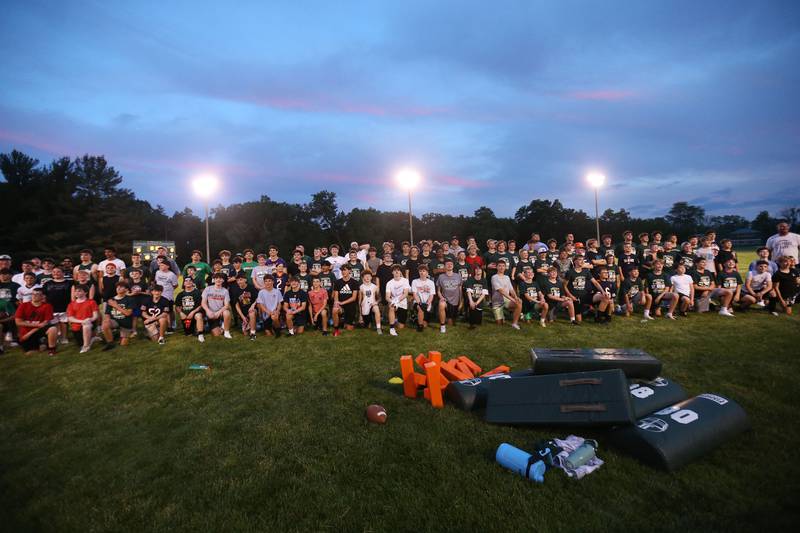 Over 100 kids take a group photo during the Tyson Bagent Offensive Skills Camp on Saturday, May 23, 2026 at St Bede Academy.