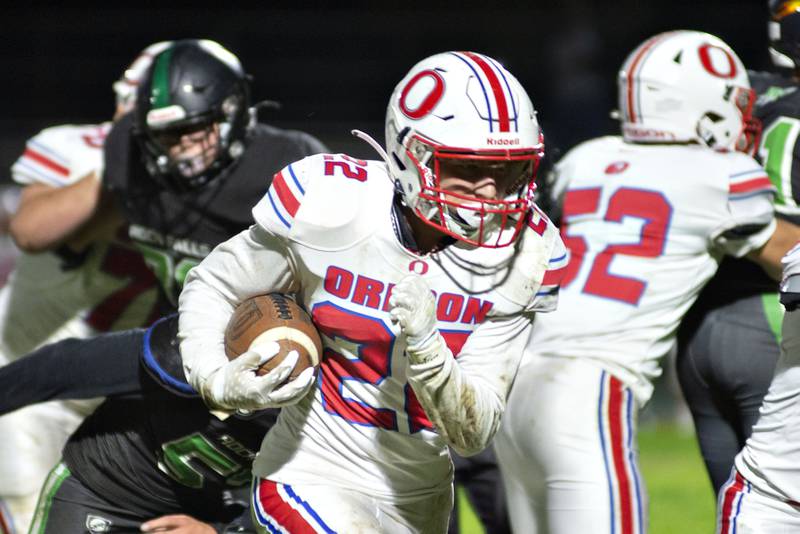 Oregon’s Gabe Eckerd runs for yards in the first half against Rock Falls Friday, Oct. 14, 2022.