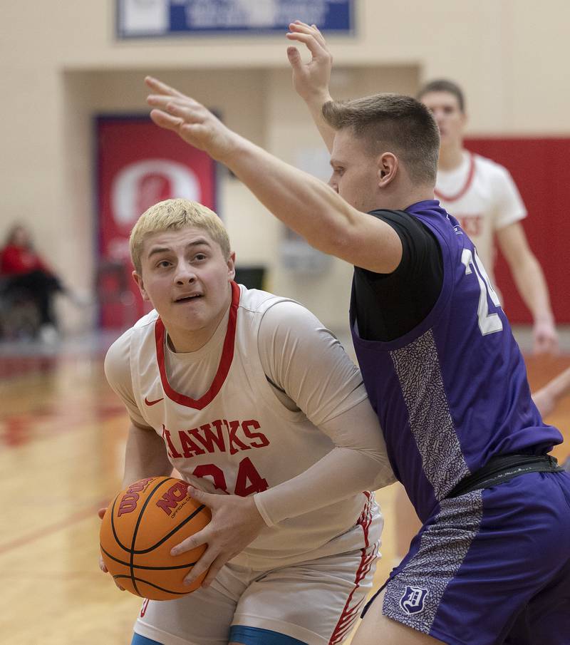 Oregon’s Kade Girton works against Dixon’s Eli Davidson Tuesday, Feb. 4, 2025, in Oregon.