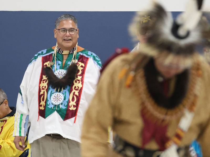Gerald Savage, a tribal elder with the Ho-Chunk Nation, watches the Grand Entry for the Starved Rock Pow Wow on Saturday, Nov. 1, 2025 at the Utice Village Hall.