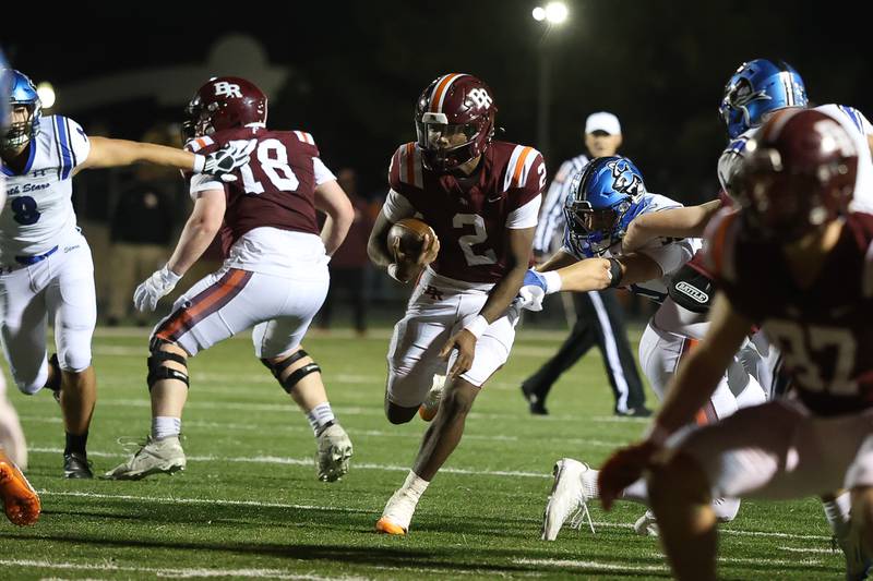 Brother Rice's C.J Gray finds room to run against St. Charles North in the third round of the playoffs on Saturday, Nov. 15, 2025 in Chicago.