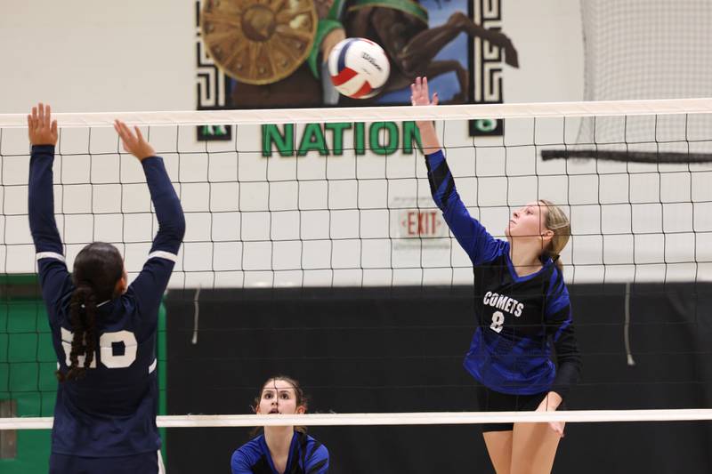 Clifton Central's Dreya Griffith tips the ball over the net during the Comets' loss in two sets, 25-20, 25-16, to Grace Christian in the IHSA Class 1A Dwight Regional quarterfinals on Monday, Oct. 27, 2025.