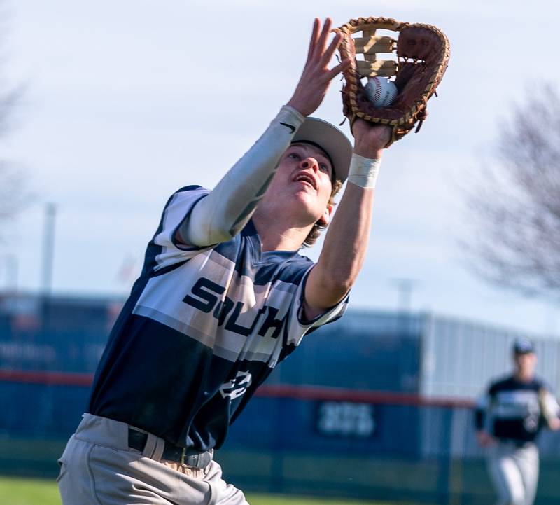 Plainfield South's Zach Fabis (2) catches a flyball against Oswego during a baseball game at Oswego High School on Monday, April 11, 2022.
