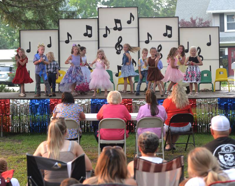 Contestants for German Valley Days' Little Miss and Mister contest perform a dance routine for the judges and crowd on Saturday, July 15, 2023.