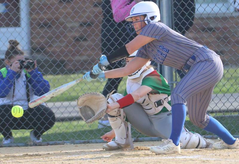 Princeton's Sylvie Rutledge reaches across the plate to make contact with the ball against L-P on Tuesday, March 24, 2026 at Little Sibera Field in Princeton.
