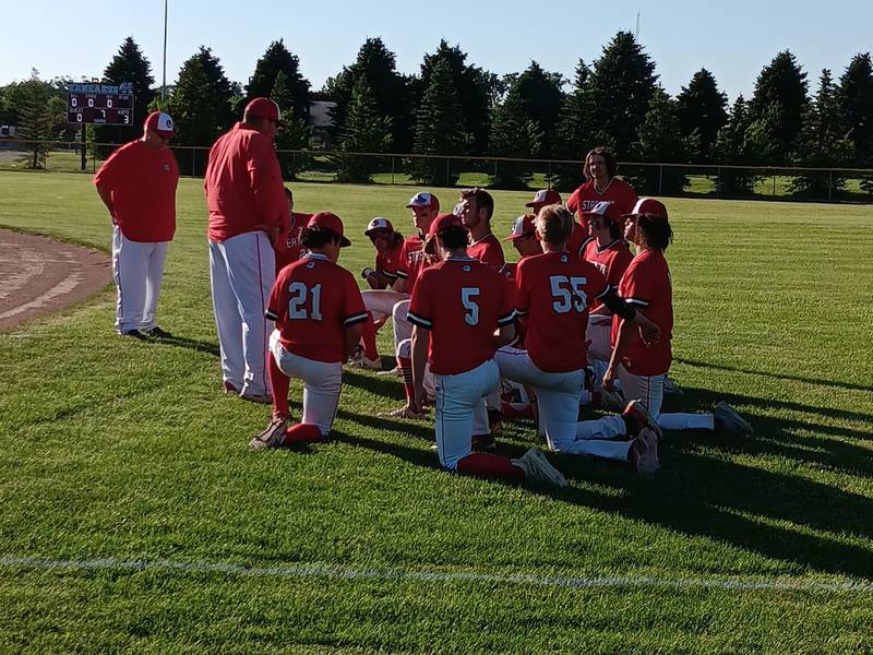 Streator coach Beau Albers addresses his team following the Bulldogs 3-0 loss to Kankakee in Class 3A Regional play on Wednesday.