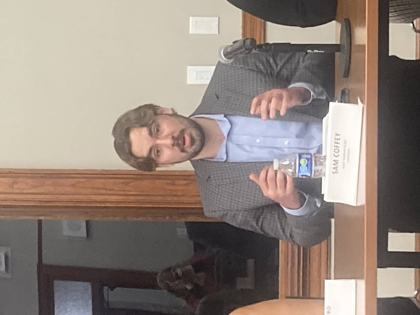 Sam Coffey speaking at the Joliet Public Schools candidate forum at the Joliet Public Library on Wednesday, Feb. 26, 2025.