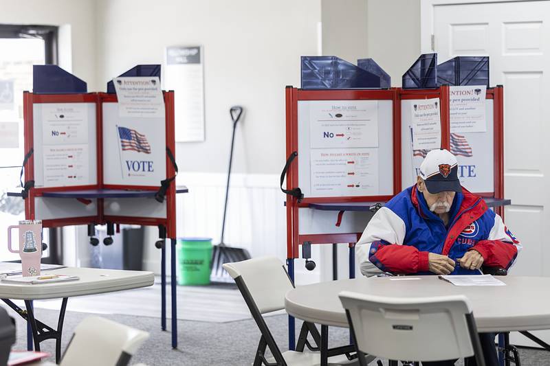 Gene Jacoby prepares to vote Tuesday, March 17, 2026, at Harvest Time Church  in Rock Falls. Election judges saw slow voter turnout for this March primary.