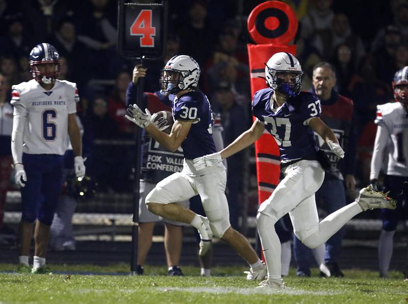Cary-Grove's Landon Moore returns a Belvidere North punt to the line of scrimmage during an IHSA Class 5A quarterfinal playoff football game on Friday, November 14, 2025, at Cary-Grove High School, in Cary.