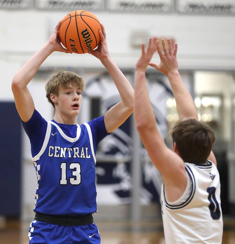 Burlington Central's Declan Wilson looks to pass the ball as he is guarded by Cary-Grove's Brandon Freund during a Fox Valley Conference  boys basketball game on Wednesday Jan. 7,  2026, at Cary-Grove High School, in Cary.