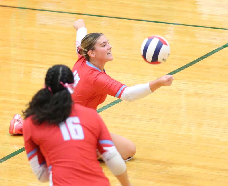 Ottawa's Olivia Evola keeps the ball alive while teammte Chey Joachim runs to assist on Tuesday, Oct. 17, 2023 at Sellett Gymnasium.