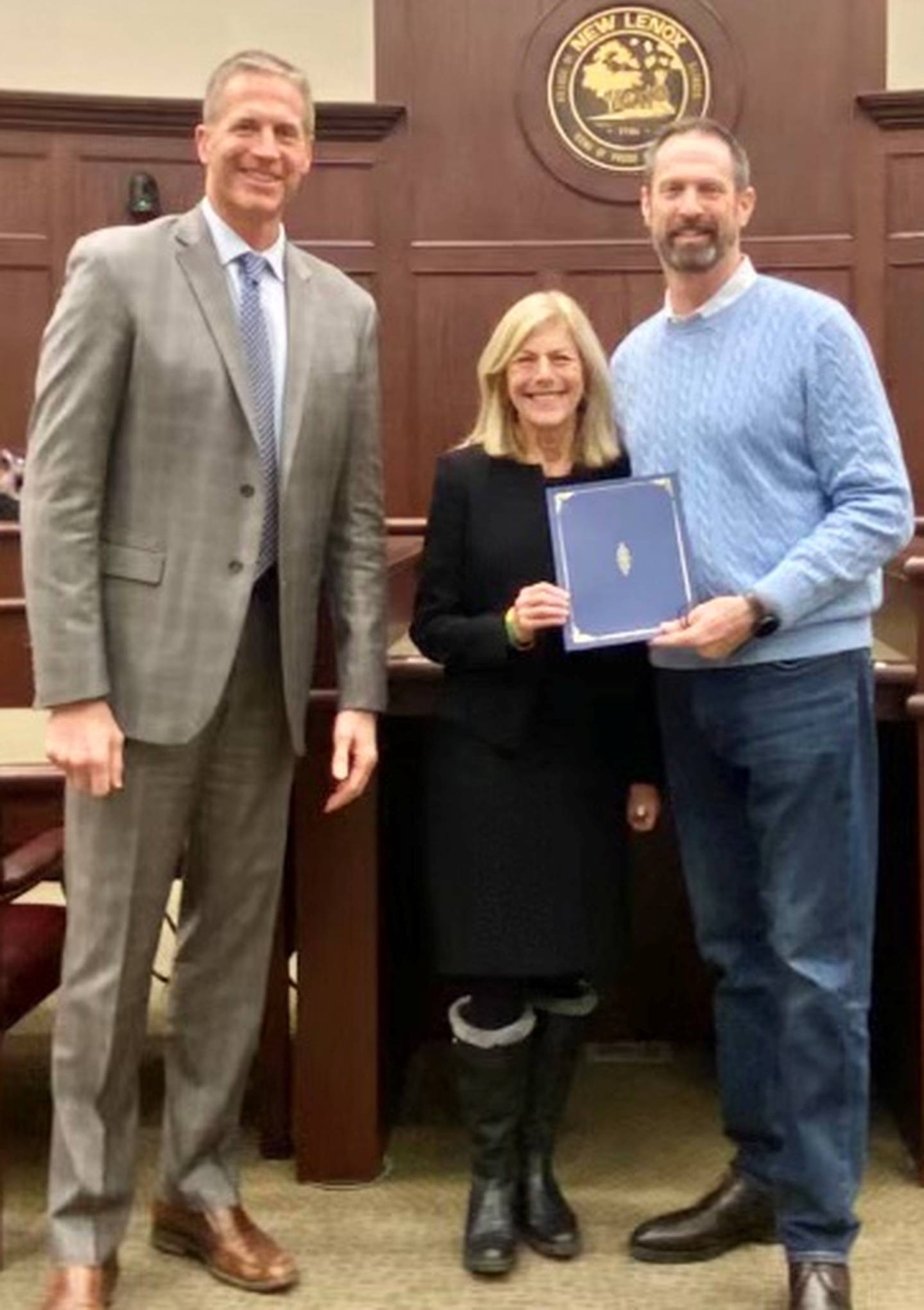 To recognize the 10th anniversary of the New Lenox campus and honor Silver Cross for its many contributions over the past decade, New Lenox Mayor Tim Baldermann read a special proclamation at the Village Board’s Feb. 14 meeting. Silver Cross Senior Vice President of External Affairs Scott Paddock (left) and Ruth Colby, President and CEO of Silver Cross Hospital, were present during the reading of the proclamation.