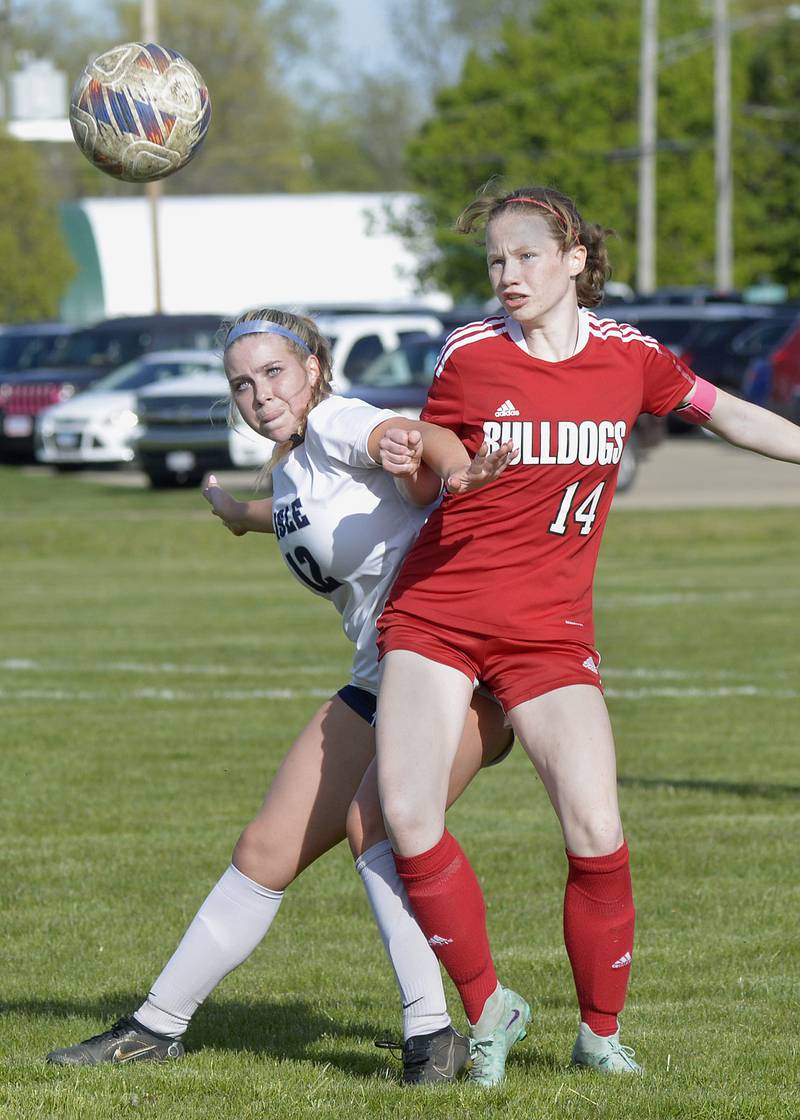 Streator’s Bridget McGurk and Lisle’s Jacklyn Roper prepare for a header on Thursday, April 25, 2024, at James Street Recreation Area in Streator.