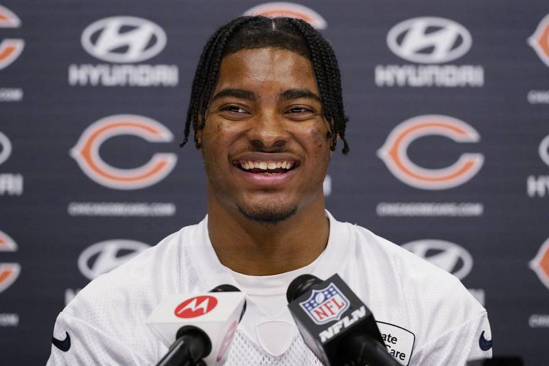 Chicago Bears safety Jaquan Brisker smiles as he speaks at a news conference during the team's rookie minicamp, Friday, May 6, 2022, at Halas Hall in Lake Forest.