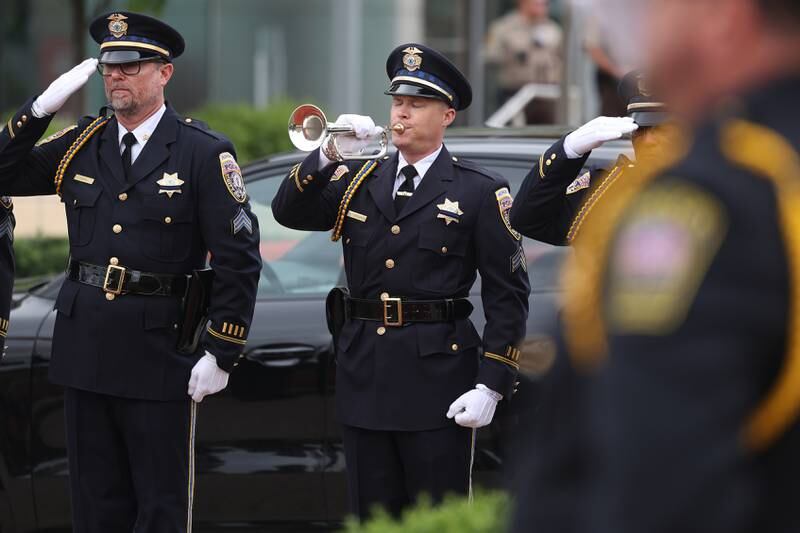 Joliet Police Sergeant Eric Zettergreen performs Taps at the Will County Law Enforcement Memorial ceremony on Thursday, May 9, 2024 in downtown Joliet.