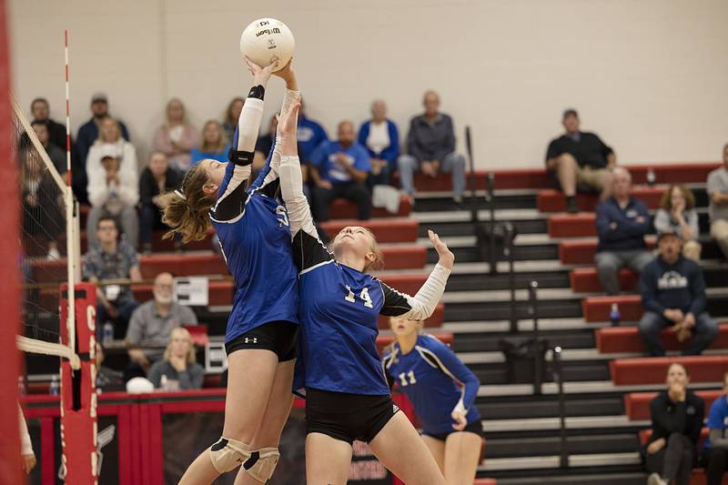 Newark’s Kodi Rizzo (left) and Lauren Ulich go after the ball in the semifinal sectional game Monday, Oct. 31, 2022 against Newman.
