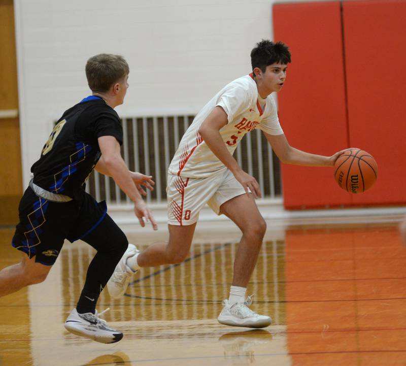 Oregon's Nole Campos (5) dribbles against Rockford Christian during the third place game at the Oregon Thanksgiving Tournament on Saturday, Nov. 25, 2023 in Oregon.