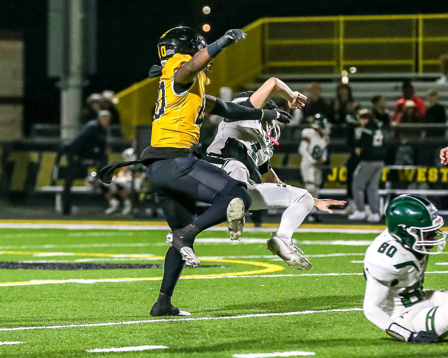 Joliet West's Mohamed Kosh (40) puts a hit on the Plainfield Central's Tommy Morrisette (1) during a football game between Plainfield Central at Joliet West on Friday, Oct 25th, 2024  in Joliet.