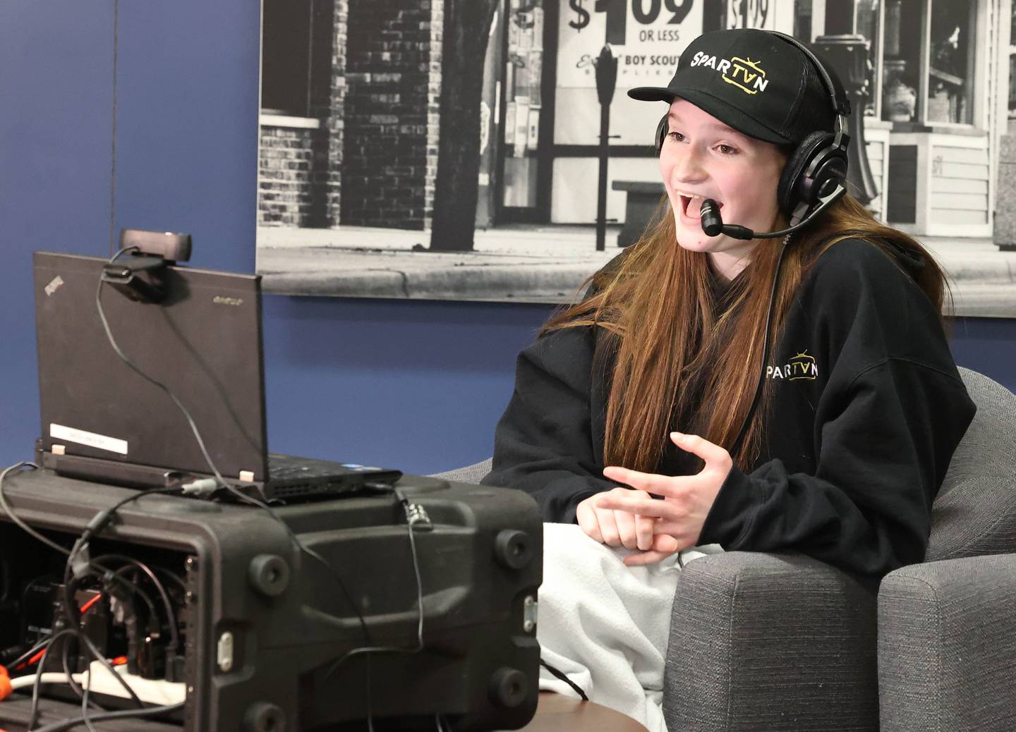 Sycamore High School freshman Lauren Smith does play-by-play during a girls basketball game Friday, Feb. 17, 2023, in the broadcast studio at the school.