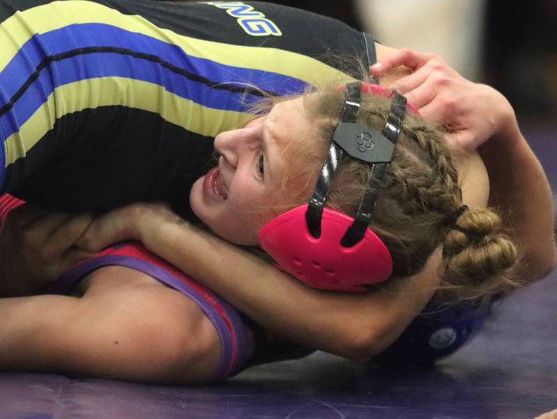 Woodstock’s Scarlet Splendora battles Wheeling’s Victoria Pina Rodriguez at 100 pounds in Whip-Pur Women’s Classic varsity girls wrestling on Saturday, Dec. 20, 2025, at Hampshire High School in Hampshire.