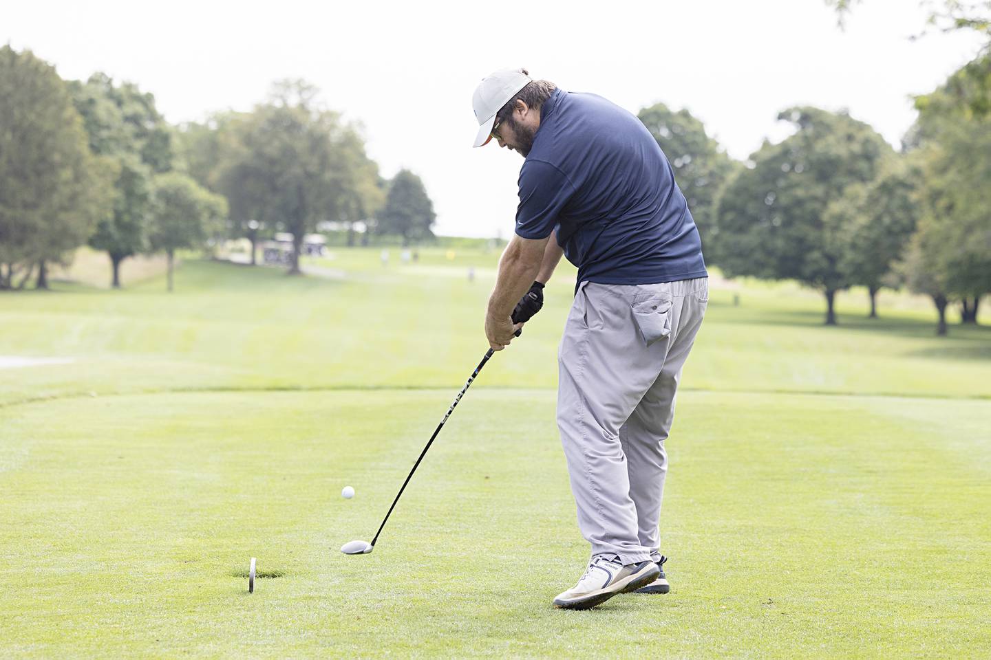 Jarred Hippen tees off to start his round Sunday, July 21, 2024 during the final round of the 102nd Lincoln Highway golf tournament. The tournament was held at Emerald Hill in Sterling.
