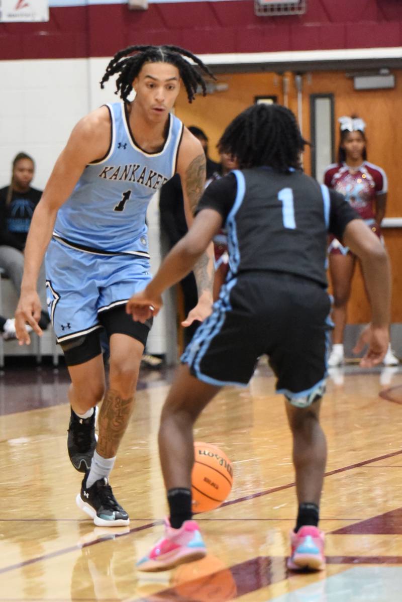 Kankakee's Lincoln Williams, left, is guarded by Thornridge's Romel Lynch during a game at Kankakee Friday, Dec. 5, 2025.