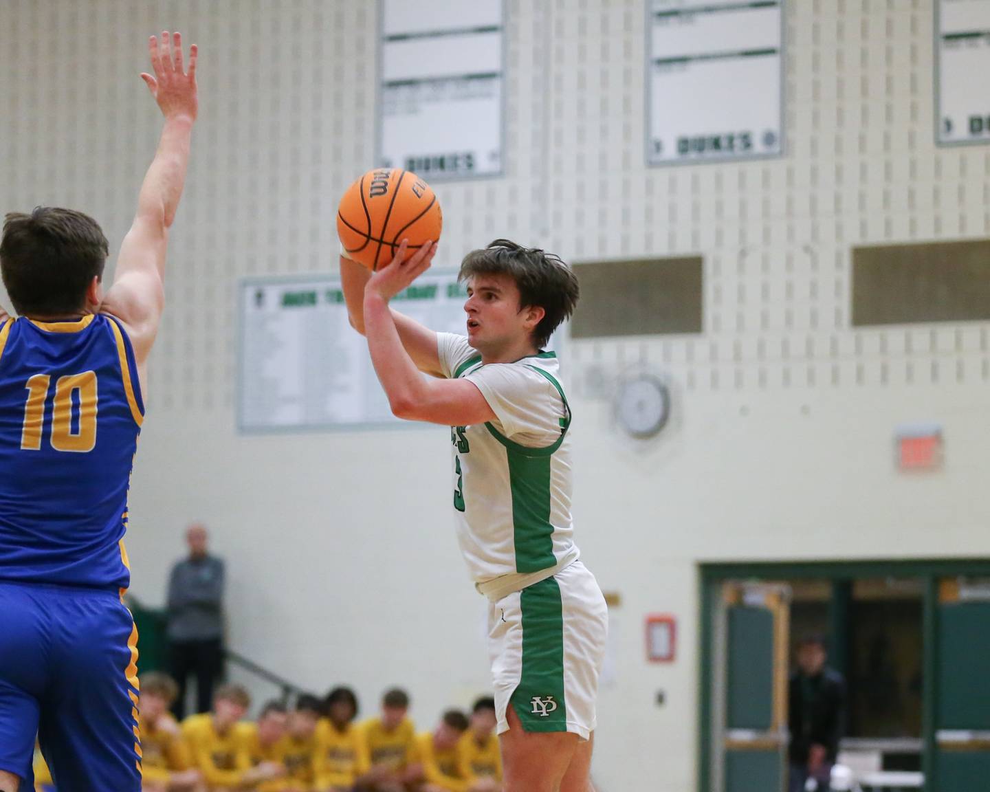 York's Connor Fitzgerald (3) shoots a three during their basketball game between Lyons at York. Jan 10, 2025 in Elmhurst.