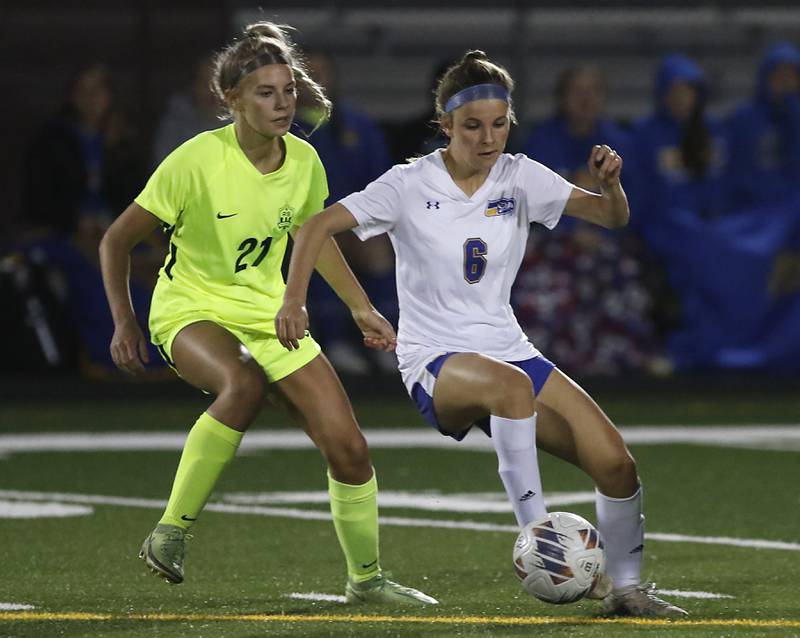 Johnsburg's Elizabeth Smith controls the ball in from t of Richmond-Burton's Blake Frericks during Kishwaukee River Conference Girls Soccer  Tournament Championship Match Wednesday, May 3, 2023, at Richmond-Burton High School.