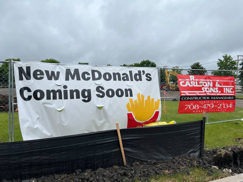 Rain mucks-up the construction site for a new McDonald's in Sycamore on May 21, 2025.